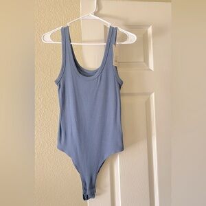 A new day tank bodysuit